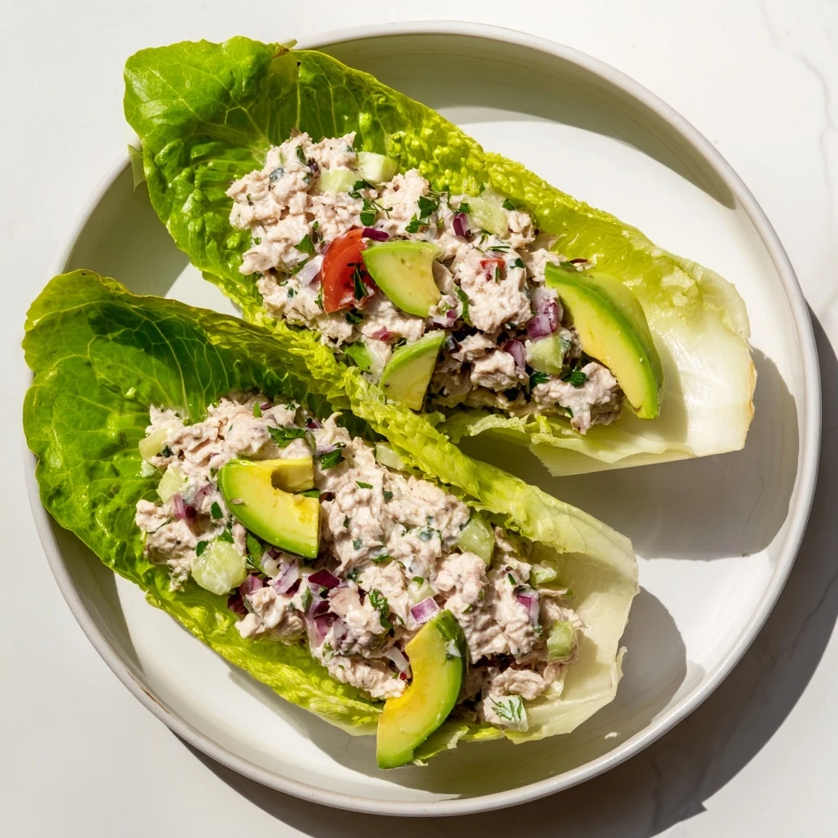 Quick and healthy tuna salad lettuce wraps, creamy and delicious tuna filling ready to be wrapped.