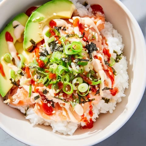 Savor the deliciousness of this Quick Classic Salmon Rice recipe with sesame seeds and nori!