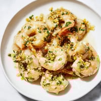 Golden garlic glistening on a plate of 15-Minute Garlic Shrimp Scampi, ready to savor.